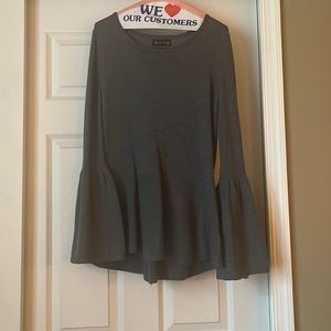 Dark gray long sleeve blouse with trumpet sleeves and waist accent